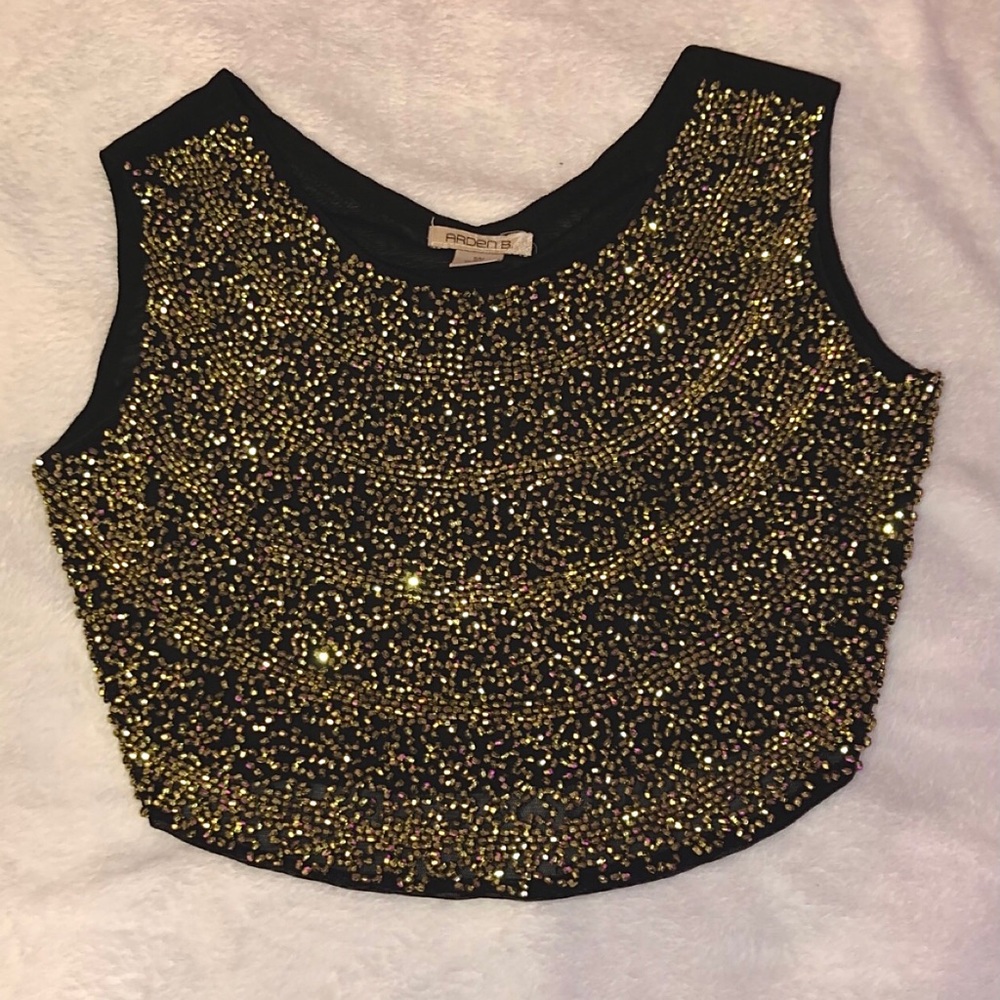 Black top with gold bead covered front